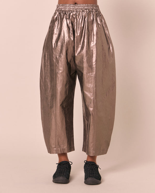 model wears mabel pewter metallic linen trousers front