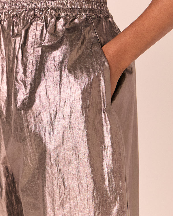 model wears mabel pewter metallic linen trousers
