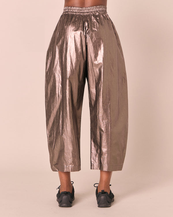 model wears mabel pewter metallic linen trousers back
