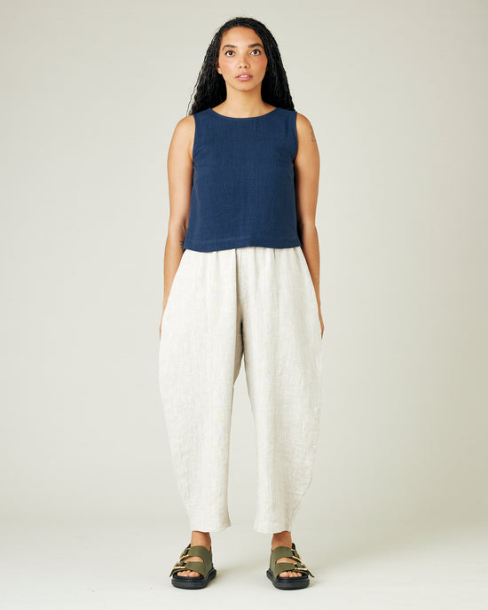 model wears natural linen mabel trousers