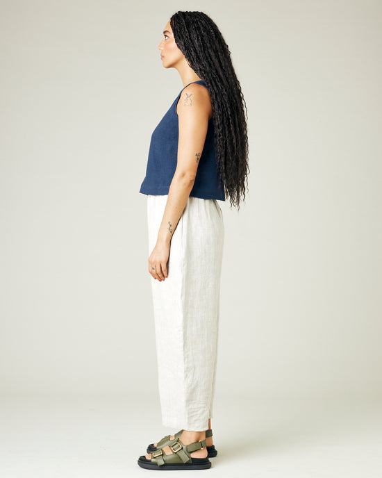 model wears natural linen mabel trousers