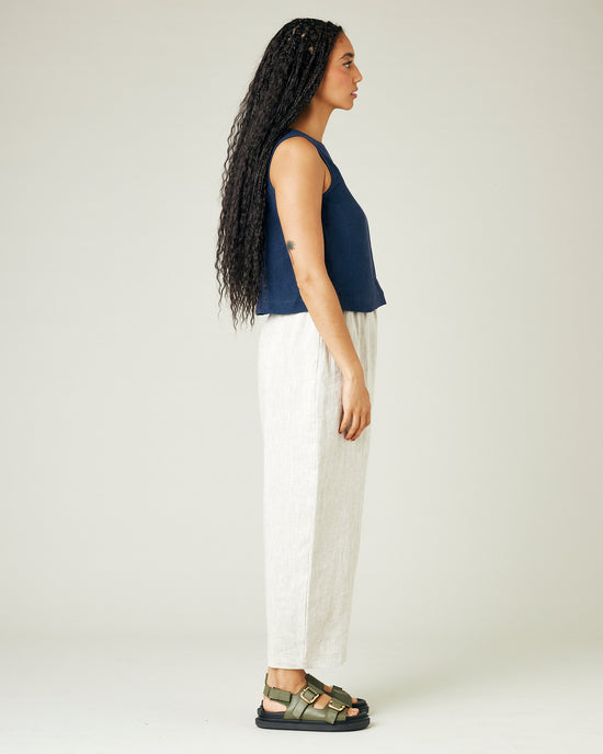 model wears natural linen mabel trousers