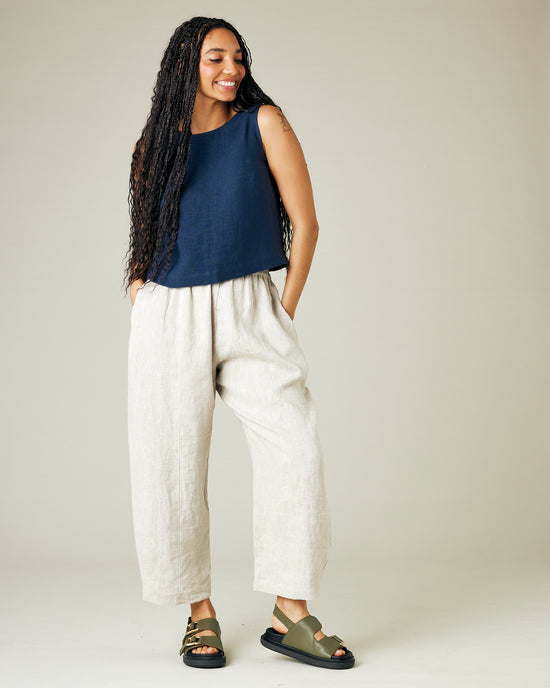 model wears natural linen mabel trousers