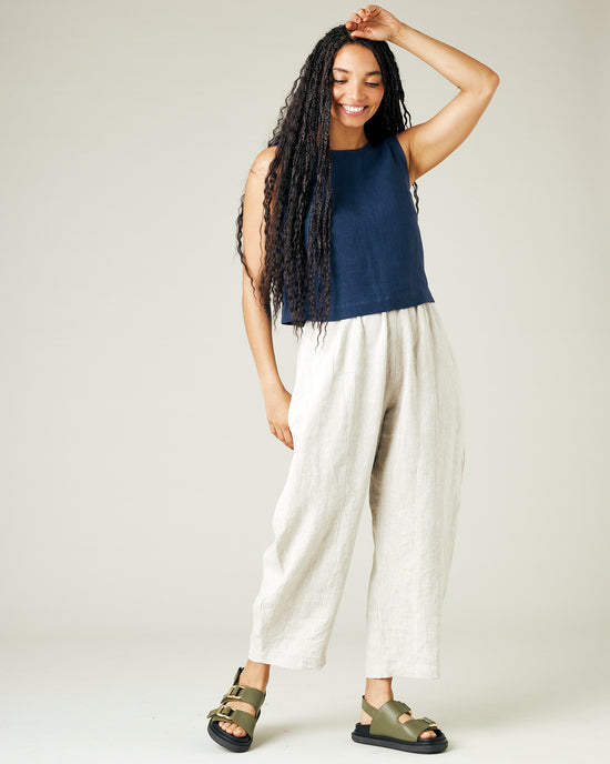 model wears natural linen mabel trousers