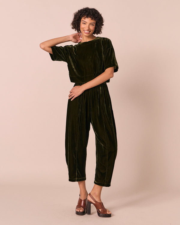 model wears mabel moss velvet trousers left