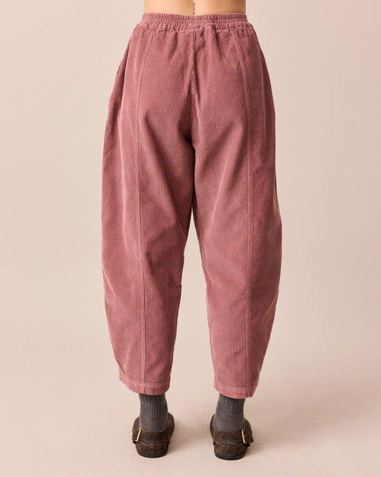 model wears mabel fig cord trousers back