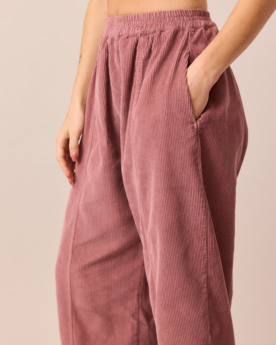 model wears mabel fig cord trousers right