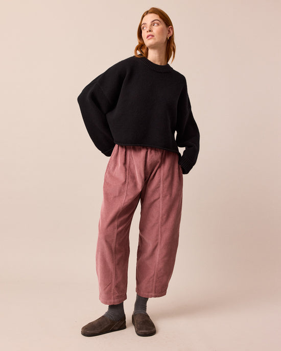 model wears mabel fig cord trousers left