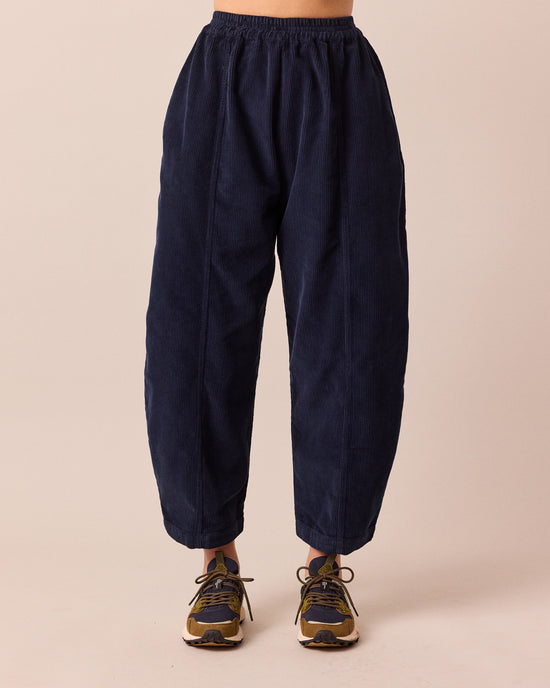 model wears mabel navy cord trousers front