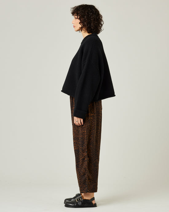 model wears mabel cupro trousers in dark leopard 