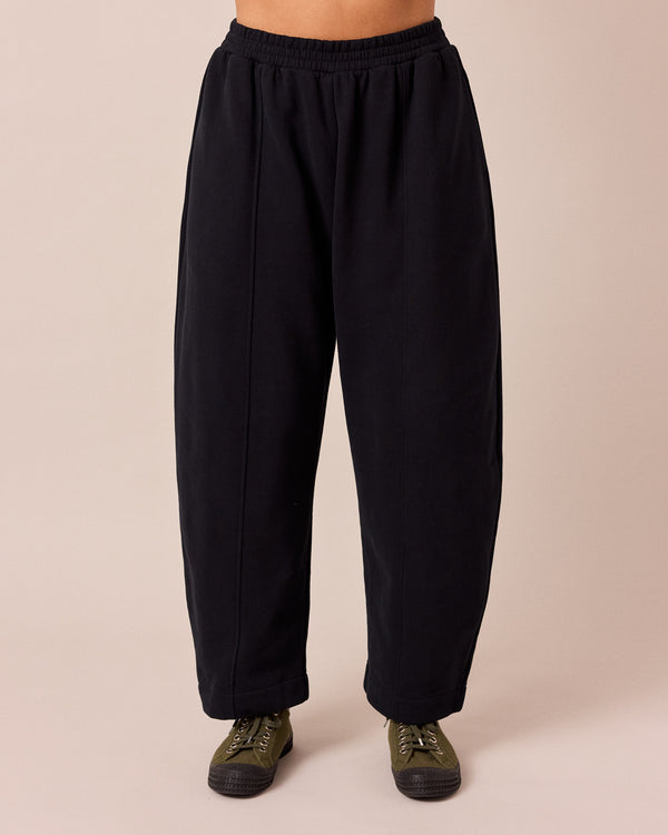 model wears mabel black fleeceback jersey trousers front