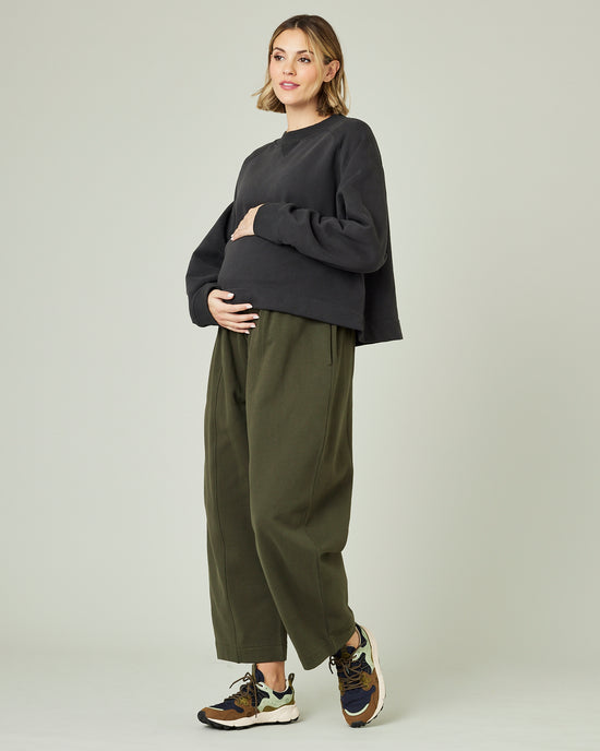 pregnant model wears olive fleeceback jersey mabel 