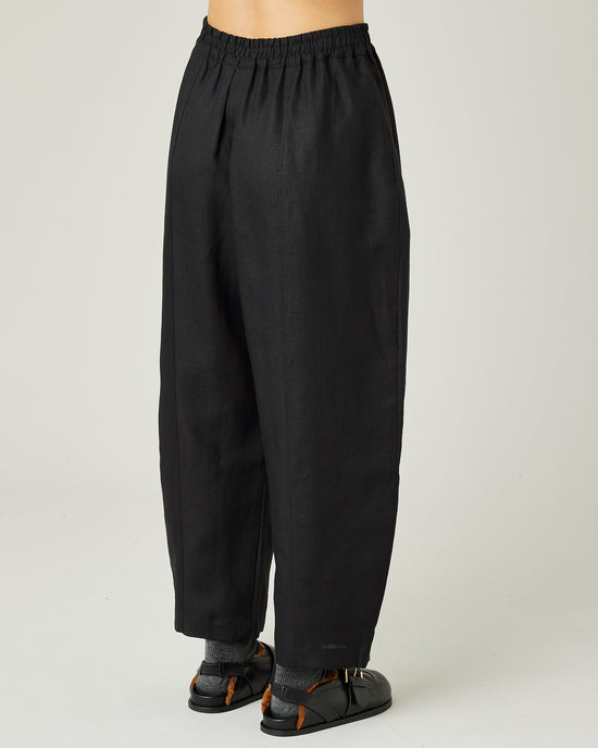 model wears black linen mabel trousers right