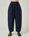 model wears navy linen mabel trousers front