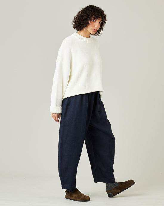 model wears navy linen mabel trousers