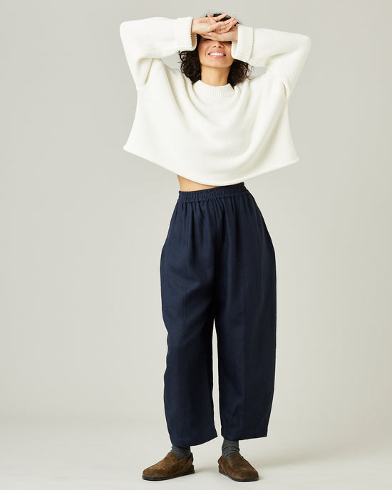 model wears navy linen mabel trousers