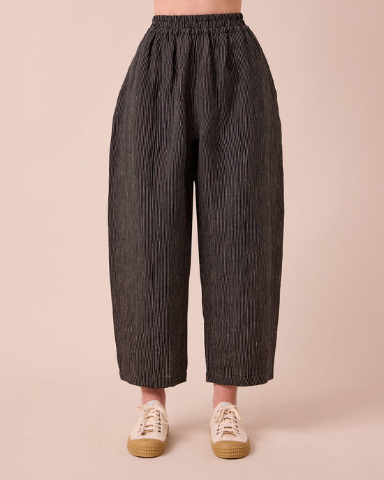 model wears mabel pencil stripe linen trousers front