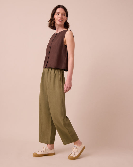 model wears mabel khaki linen trousers right