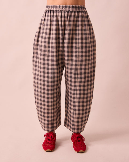 model wears mabel stone gingham linen trousers front