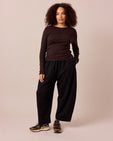 model wears mabel black loopback jersey trousers right