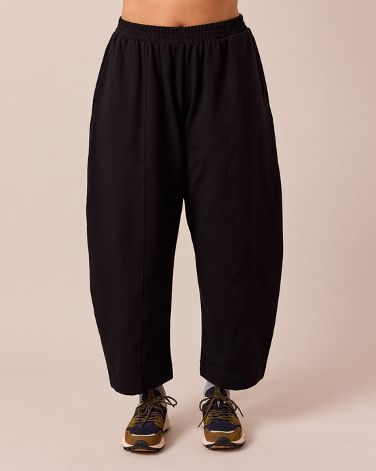 model wears mabel black loopback jersey trousers front