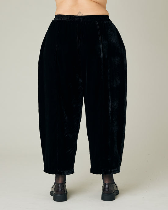 model wears black velvet mabel trousers