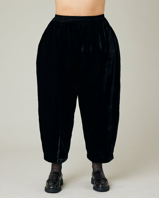 model wears black velvet mabel trousers