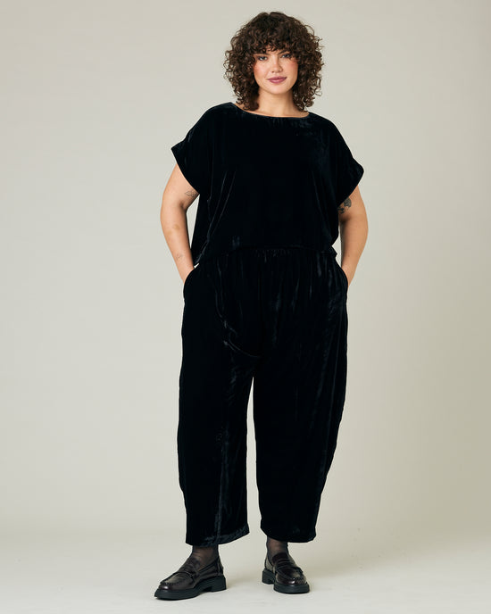 model wears black velvet polly top and mabel trousers