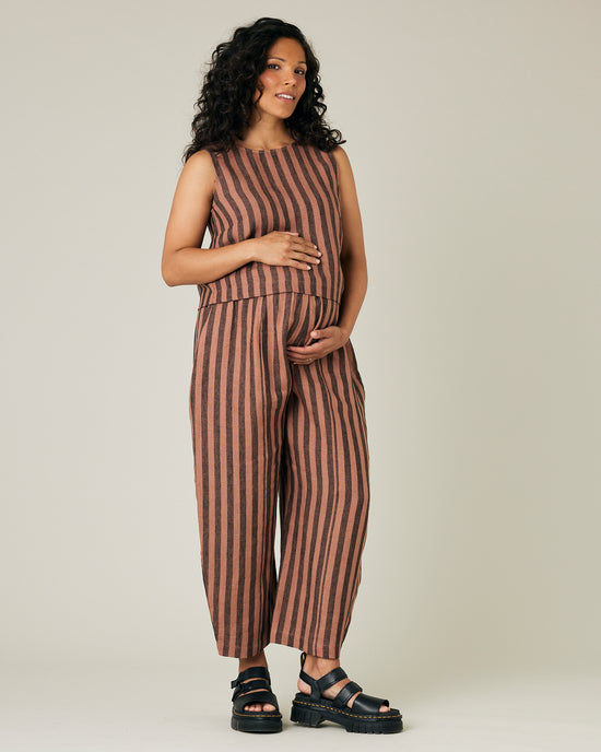 pregnant model wears longer length biscuit stripe mabel trousers