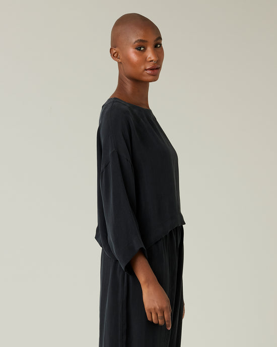 model wears black cupro lily top