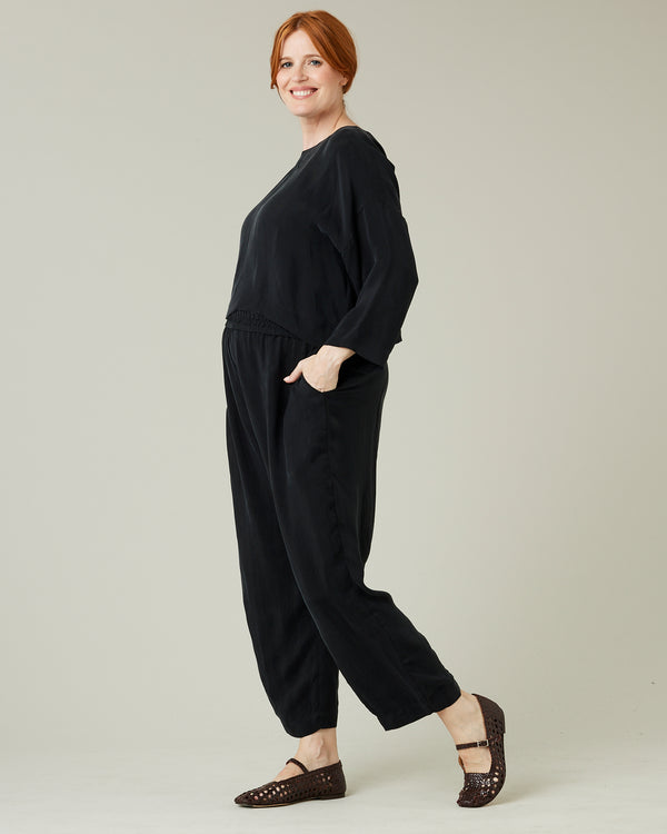 pregnant model wears black cupro lily top