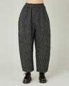 model wears black and ecru pencil stripe linen mabel trousers front