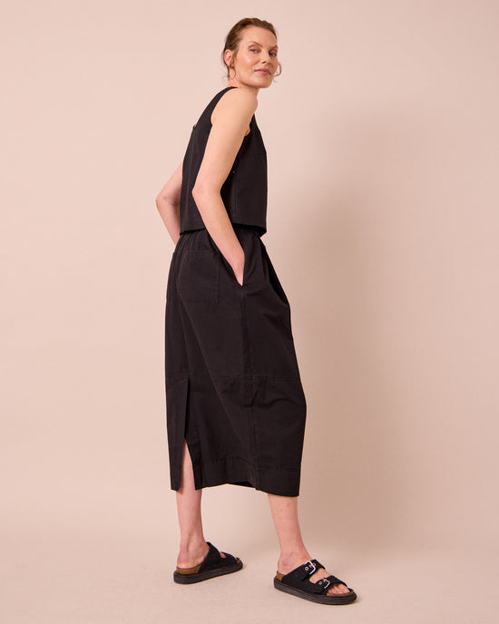 model wears macey black cotton linen skirt