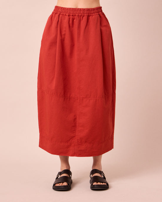 model wears macey brick cotton linen skirt