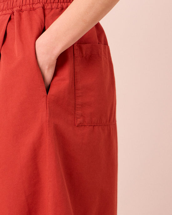 model wears macey brick cotton linen skirt