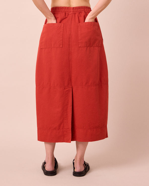 model wears macey brick cotton linen skirt