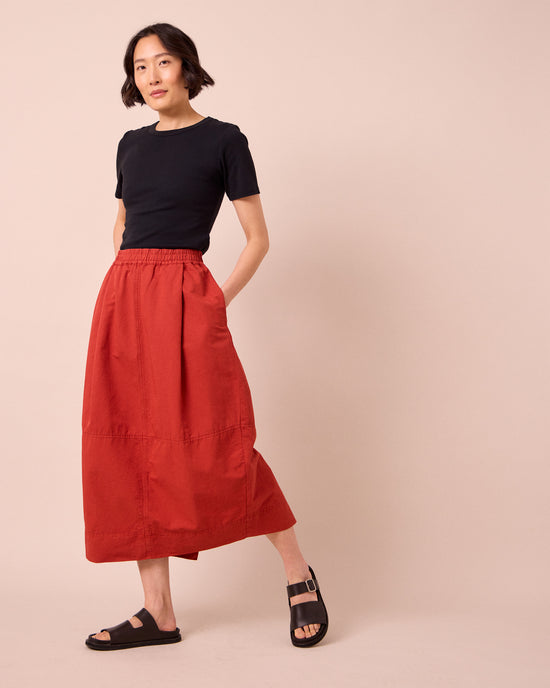 model wears macey brick cotton linen skirt