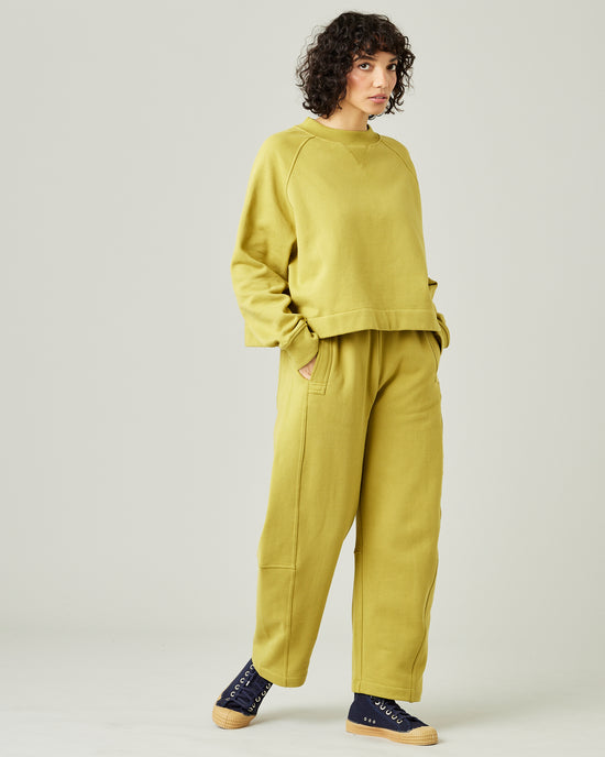 model wears pistachio madi trousers 