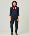 model wears navy margot jersey jumpsuit 