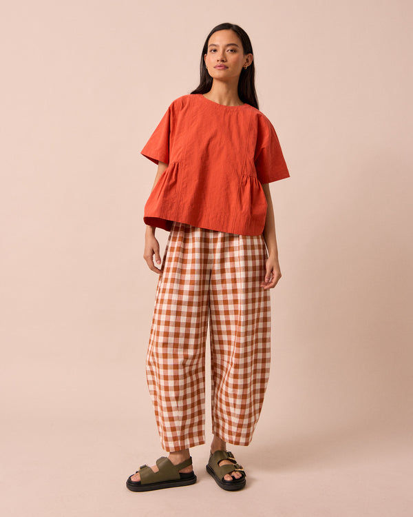 models wears marlow sunblush self stripe cotton top 