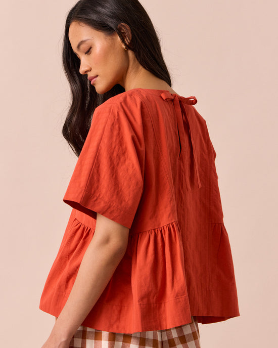 models wears marlow sunblush self stripe cotton top 