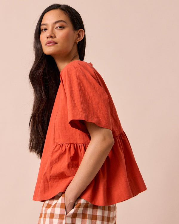 models wears marlow sunblush self stripe cotton top 