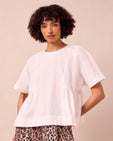 model wears marlow ecru cotton top