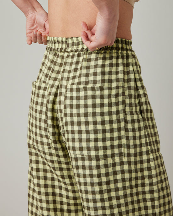 model wears matcha gingham mabel linen