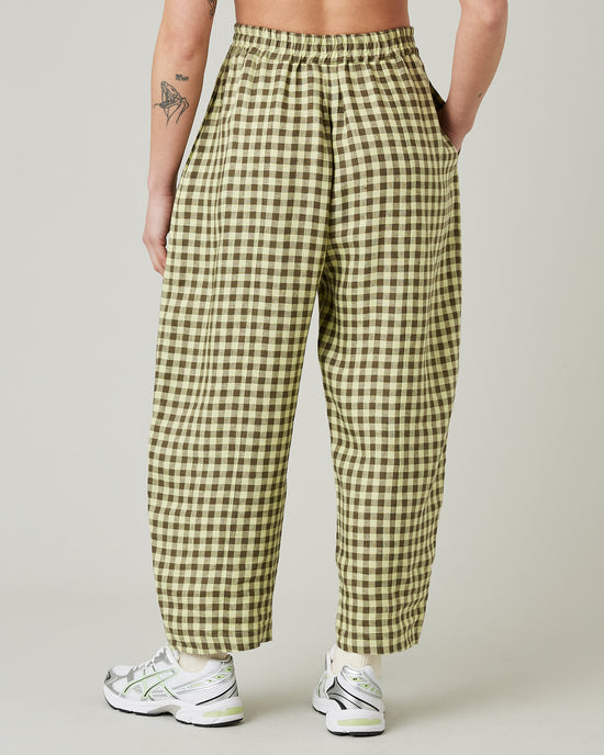 model wears matcha gingham linen mabel trousers back