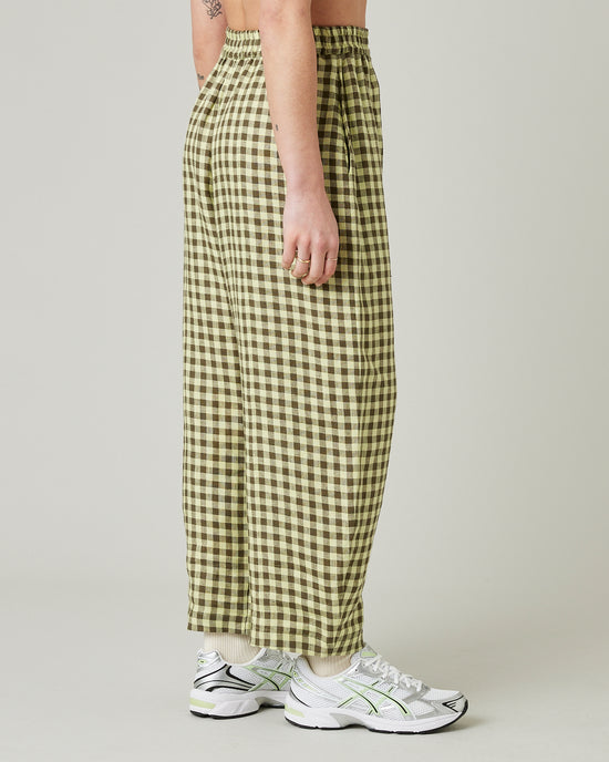 model wears matcha gingham linen mabel trousers right