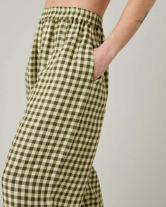 model wears matcha gingham linen mabel trousers