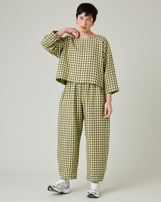 model wears matcha gingham linen mabel trousers