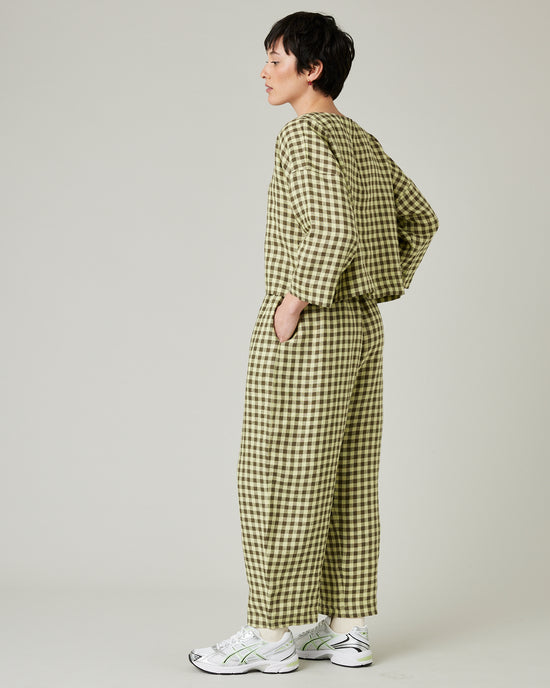 model wears matcha gingham linen mabel trousers