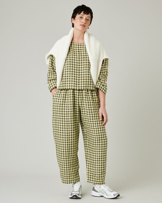 model wears matcha gingham linen mabel trousers